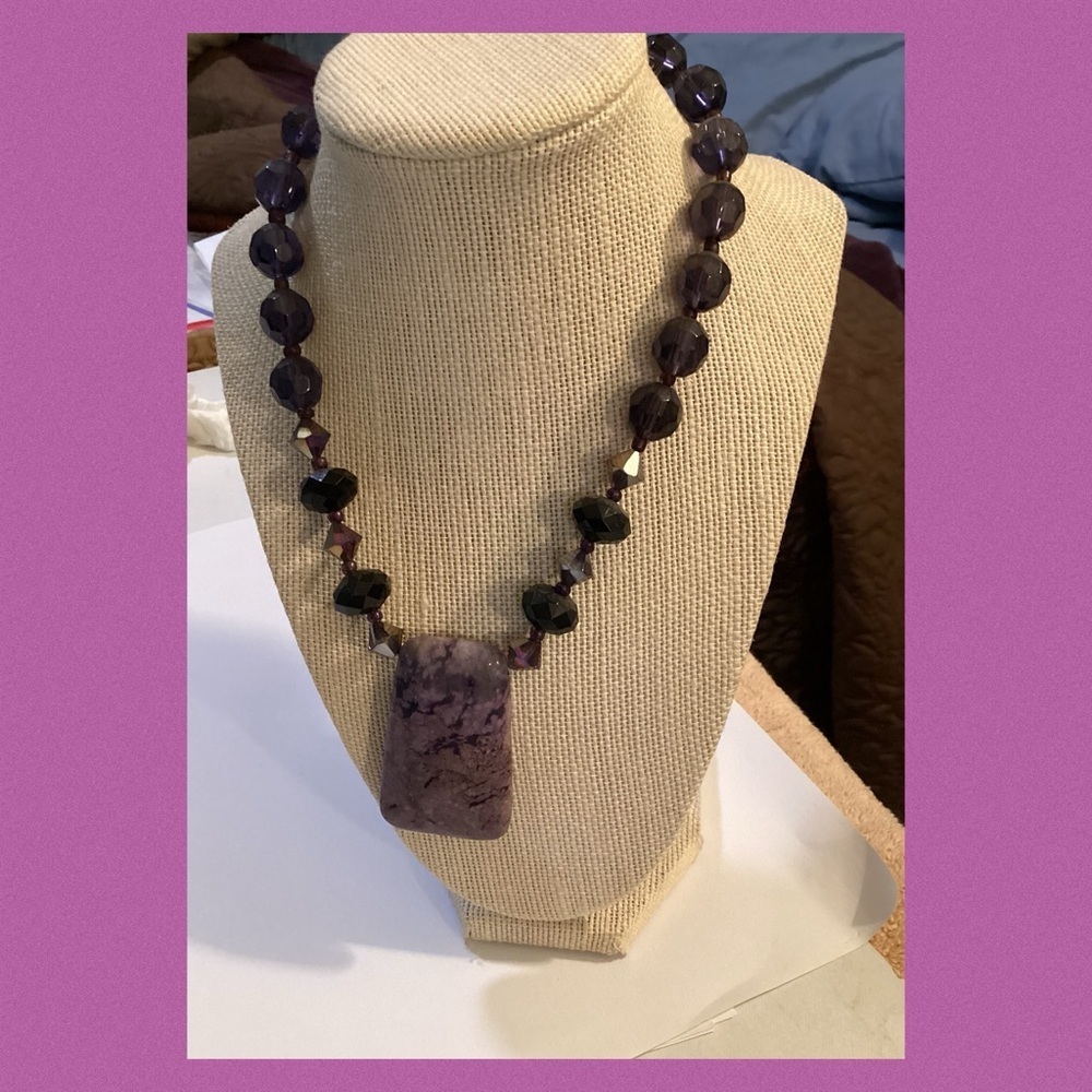 Purple and black stone necklace.